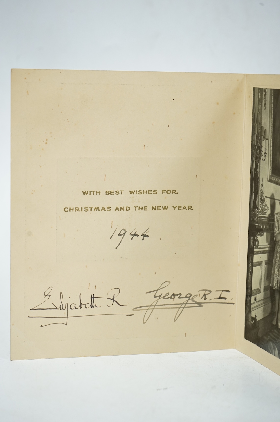 A Royal Christmas card from HM King George VI and Queen Elizabeth for 1944, published by Raphael Tuck and Sons Ltd. with a gilt embossed crown on the front, inside; ‘with best wishes for Christmas and the New Year 1944,